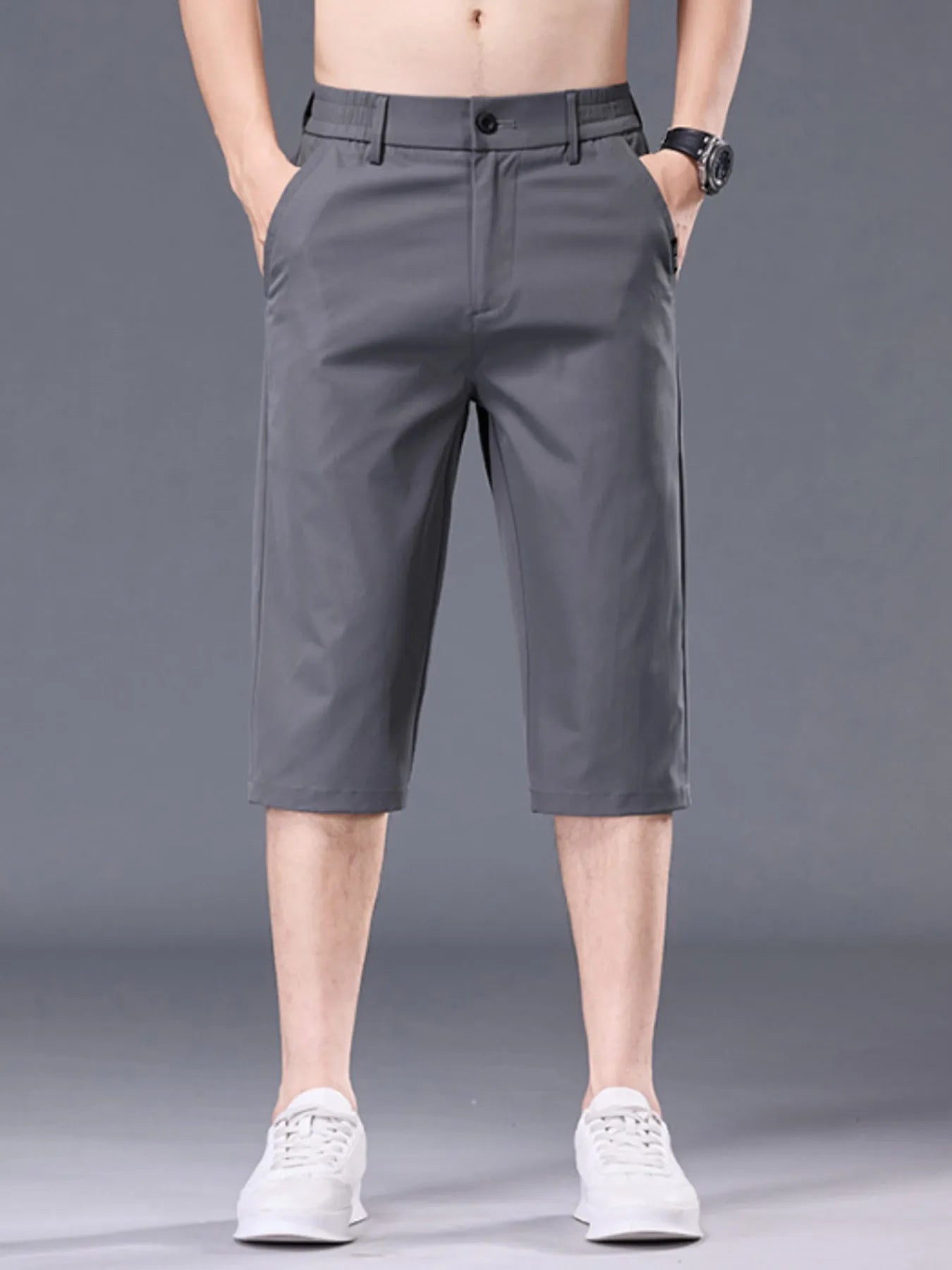 Men's plus size casual stretch shorts with pockets, featuring a relaxed fit and comfortable design by Trendsi.