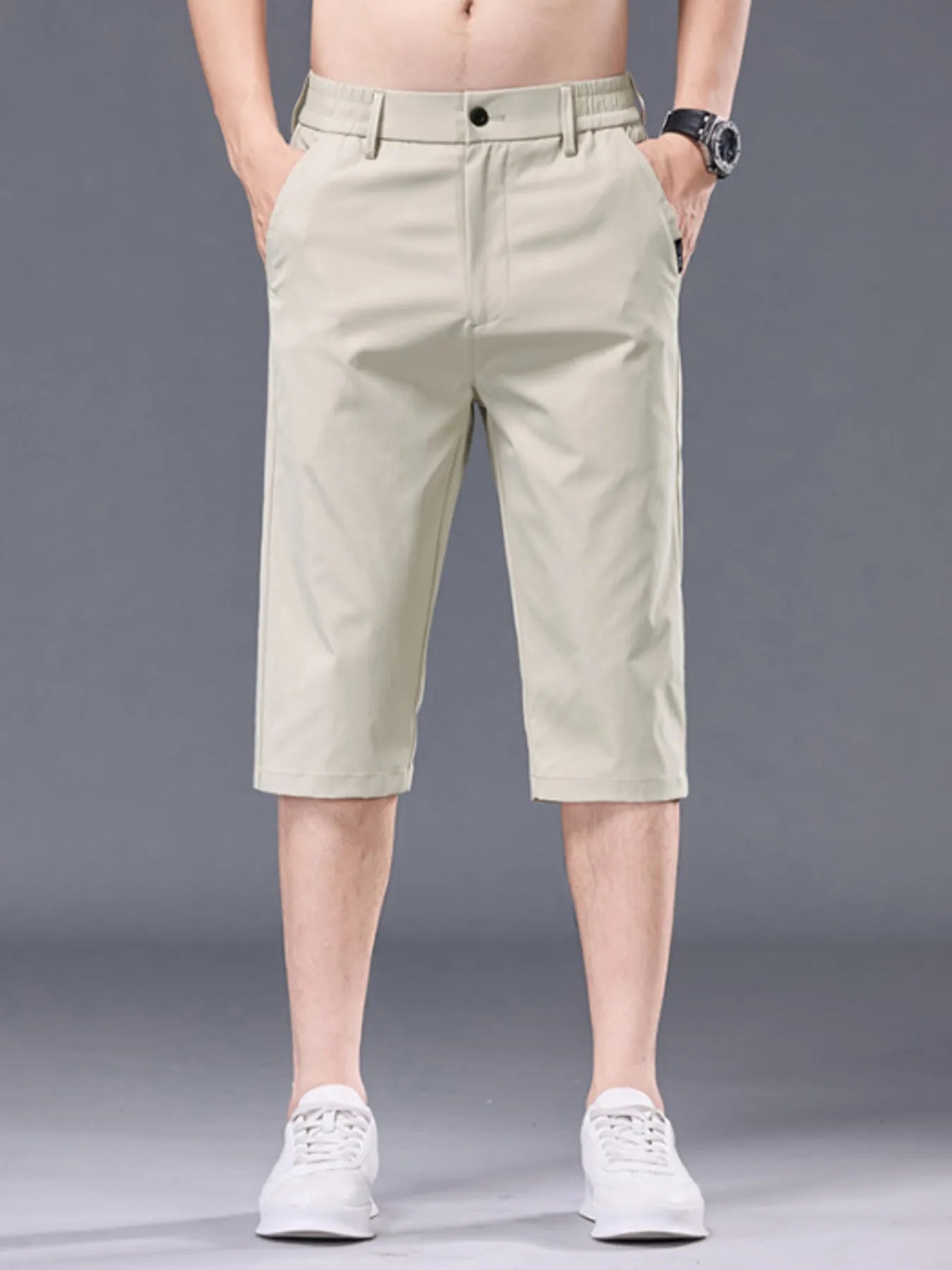 Men's plus size casual stretch shorts with pockets, comfortable and versatile men's shorts by Trendsi, suitable for everyday wear.