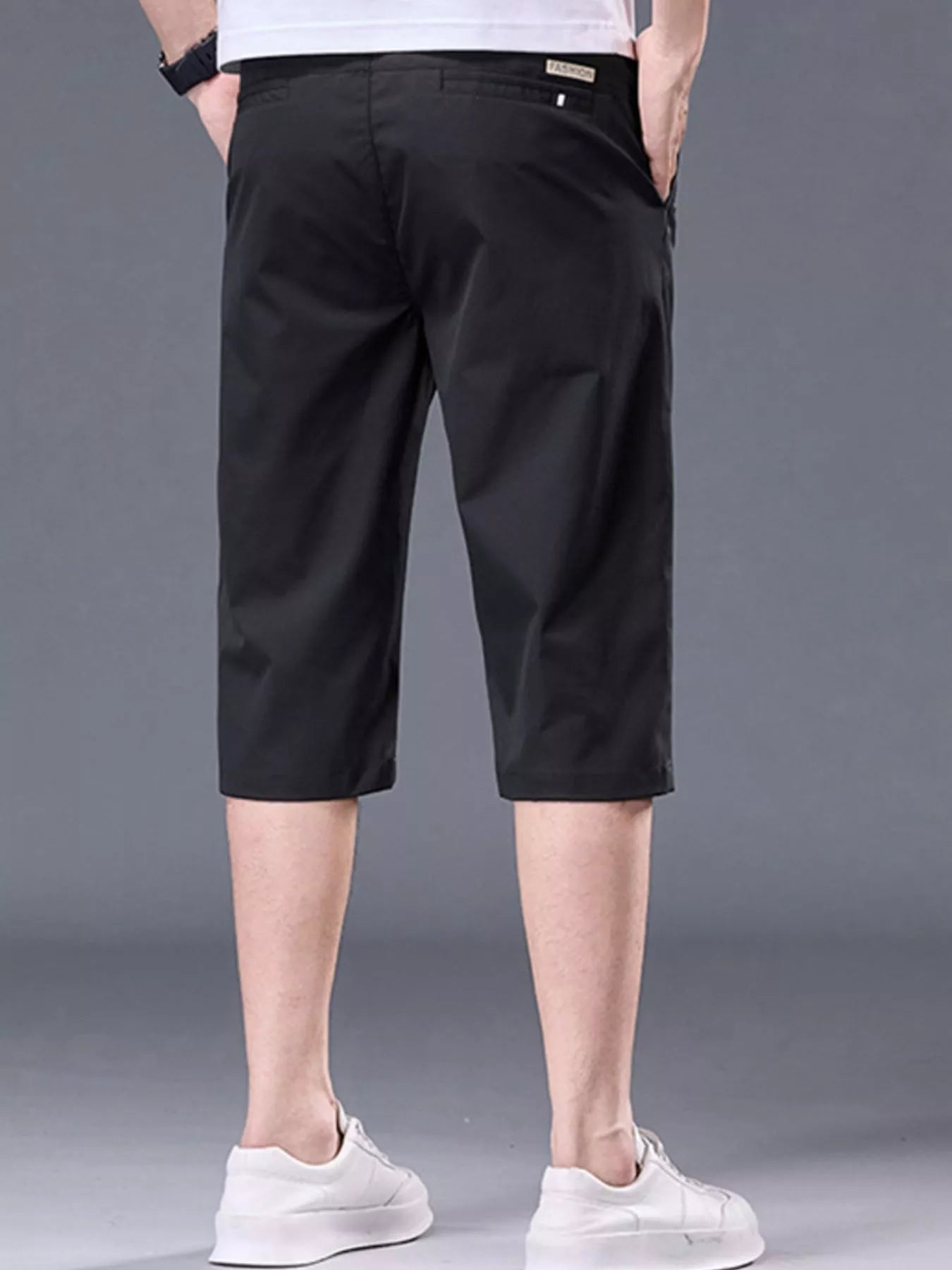 Plus size men's casual stretch shorts with pockets, featuring a comfortable fit and versatile design by Trendsi.