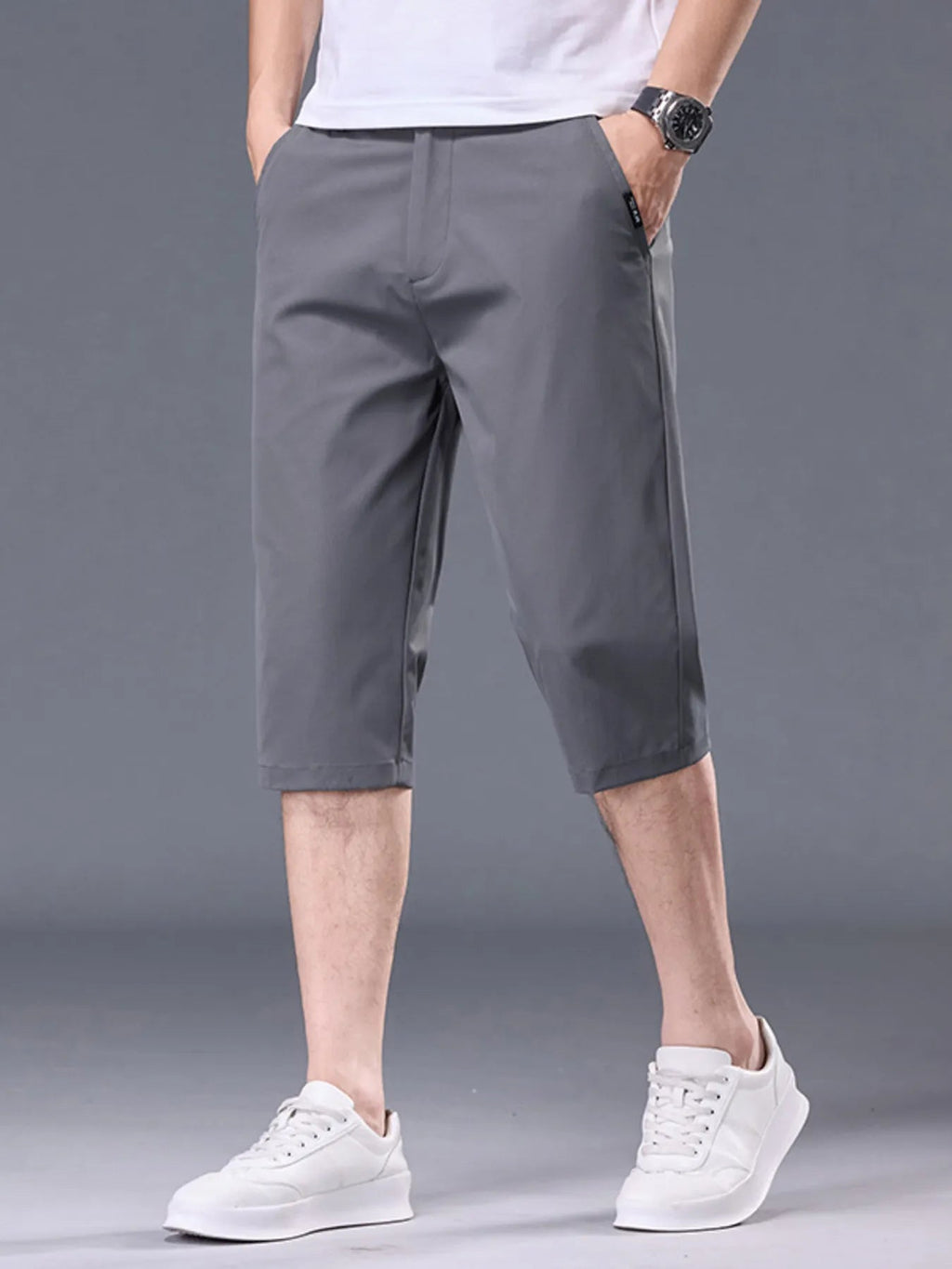 Men's plus size casual stretch shorts with pockets, featuring a comfortable fit and versatile style, by Trendsi.