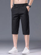 Plus size men's casual stretch shorts with pockets, denim-style fabric and comfortable fit, by Trendsi.