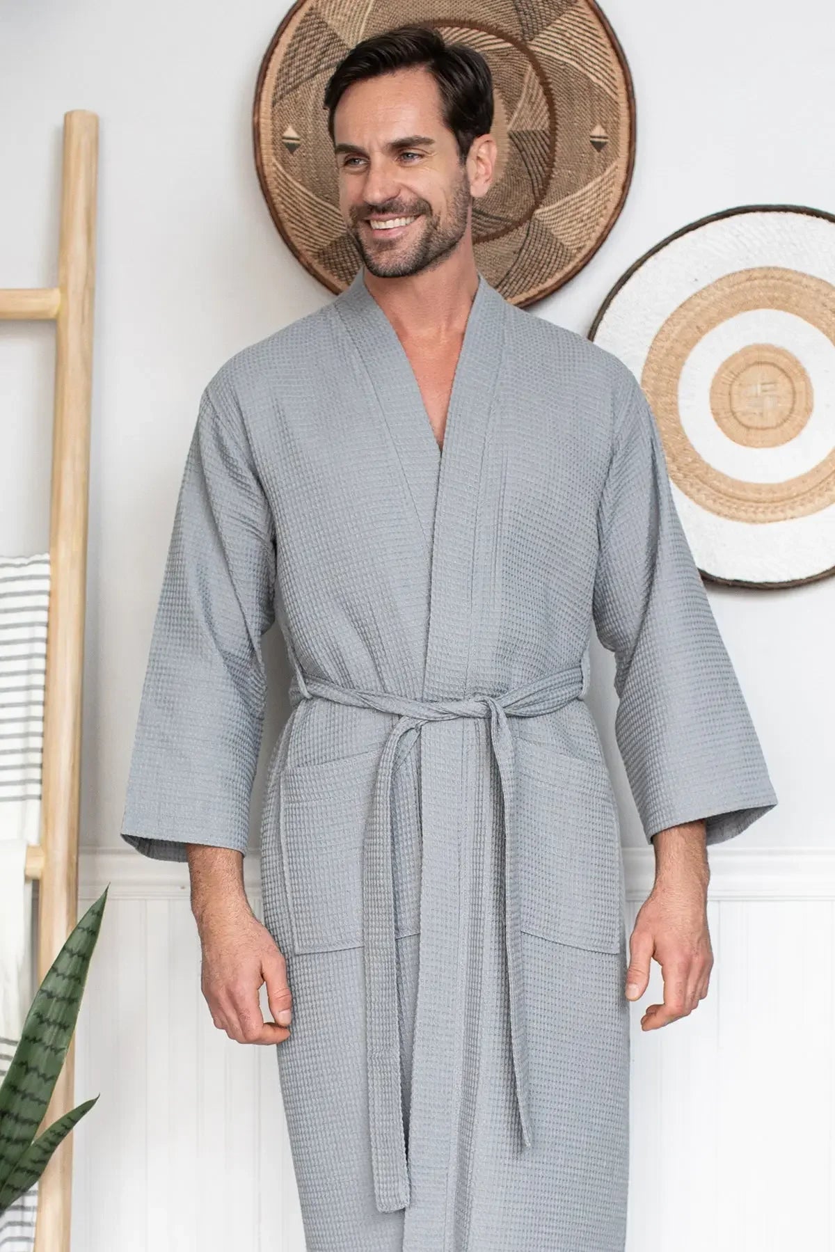 Men's waffle spa bathrobe by Plush Fashion Hub, lightweight and absorbent, shown hanging with a relaxed fit and textured fabric.
