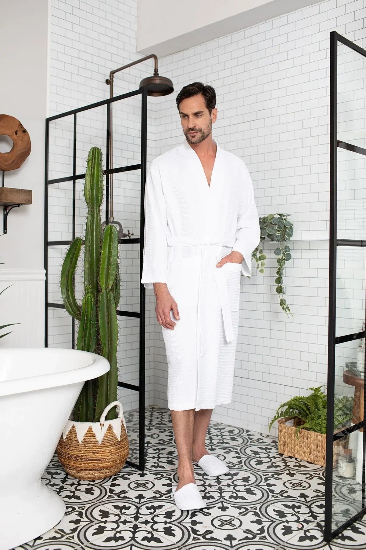 Men's waffle spa bathrobe from Plush Fashion Hub, lightweight and absorbent, shown hanging with a relaxed fit and soft texture.