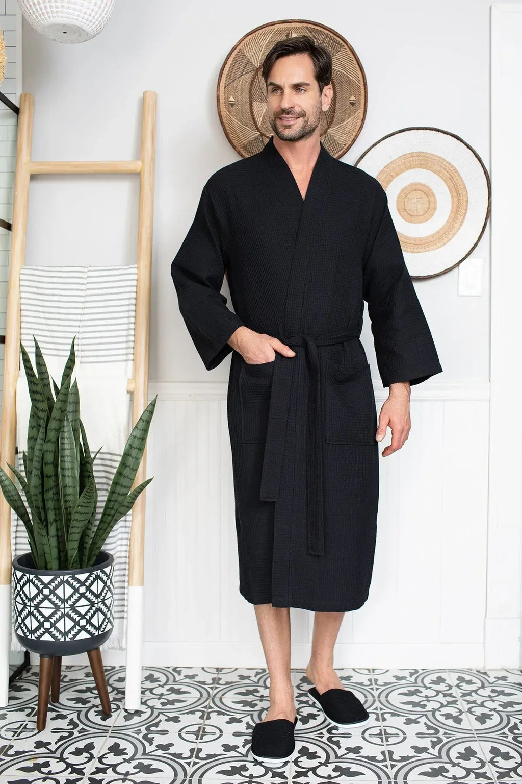 Men's waffle spa bathrobe by Plush Fashion Hub, lightweight and absorbent, shown draped over a man in a bathroom setting.