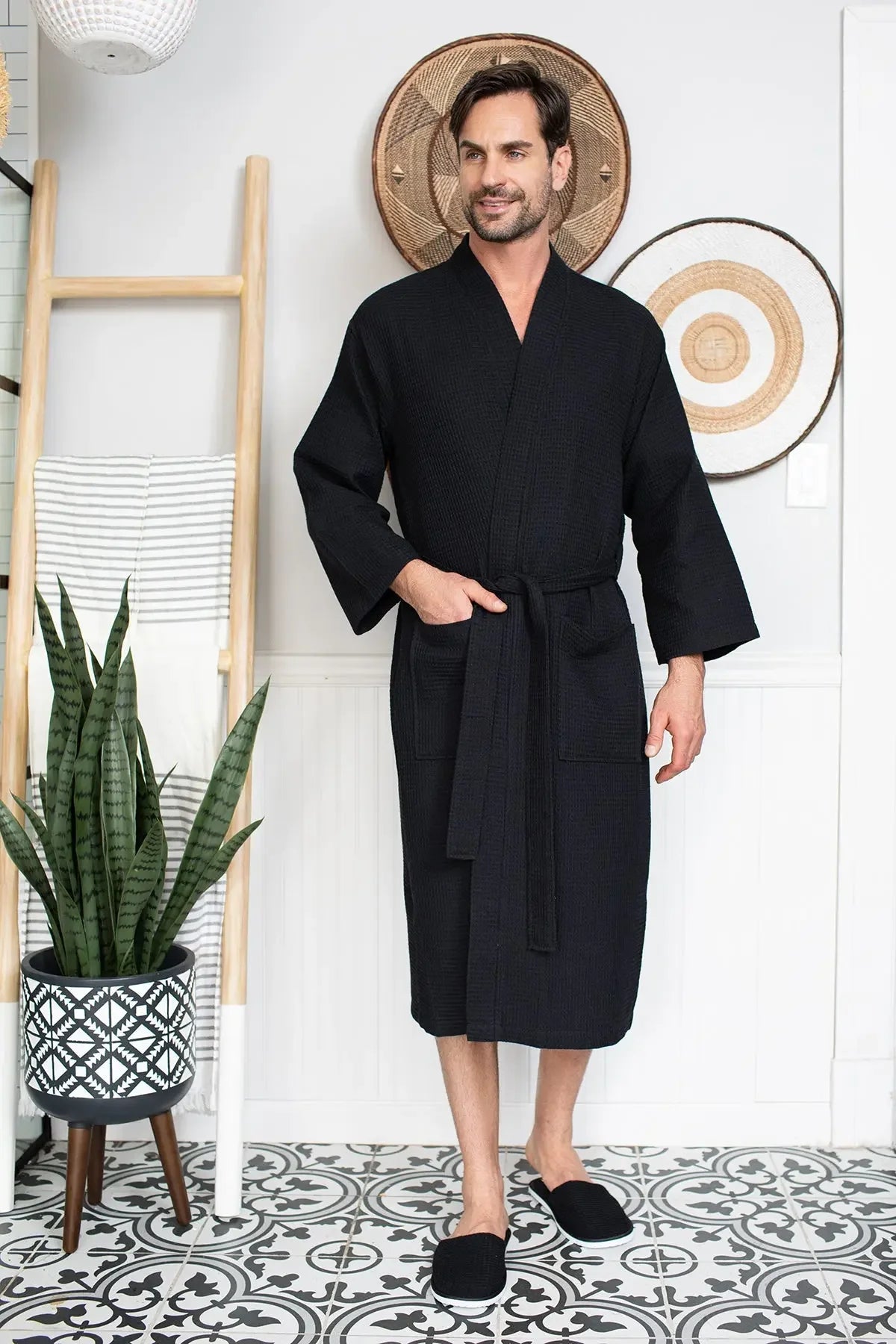Men's waffle spa bathrobe by Plush Fashion Hub, lightweight and absorbent, shown draped over a man in a bathroom setting.