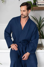 Men's waffle spa bathrobe by Plush Fashion Hub, lightweight and absorbent, shown hanging with a relaxed fit and textured fabric.