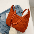 Millie embroidered shoulder bag by Plush Fashion Hub featuring intricate embroidery and a stylish design.