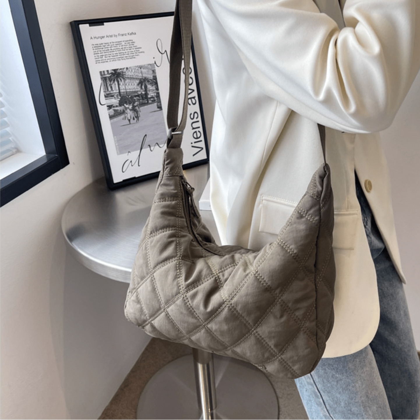 Embroidered Millie shoulder bag by Plush Fashion Hub with floral detailing and adjustable strap, stylish accessory for everyday use.