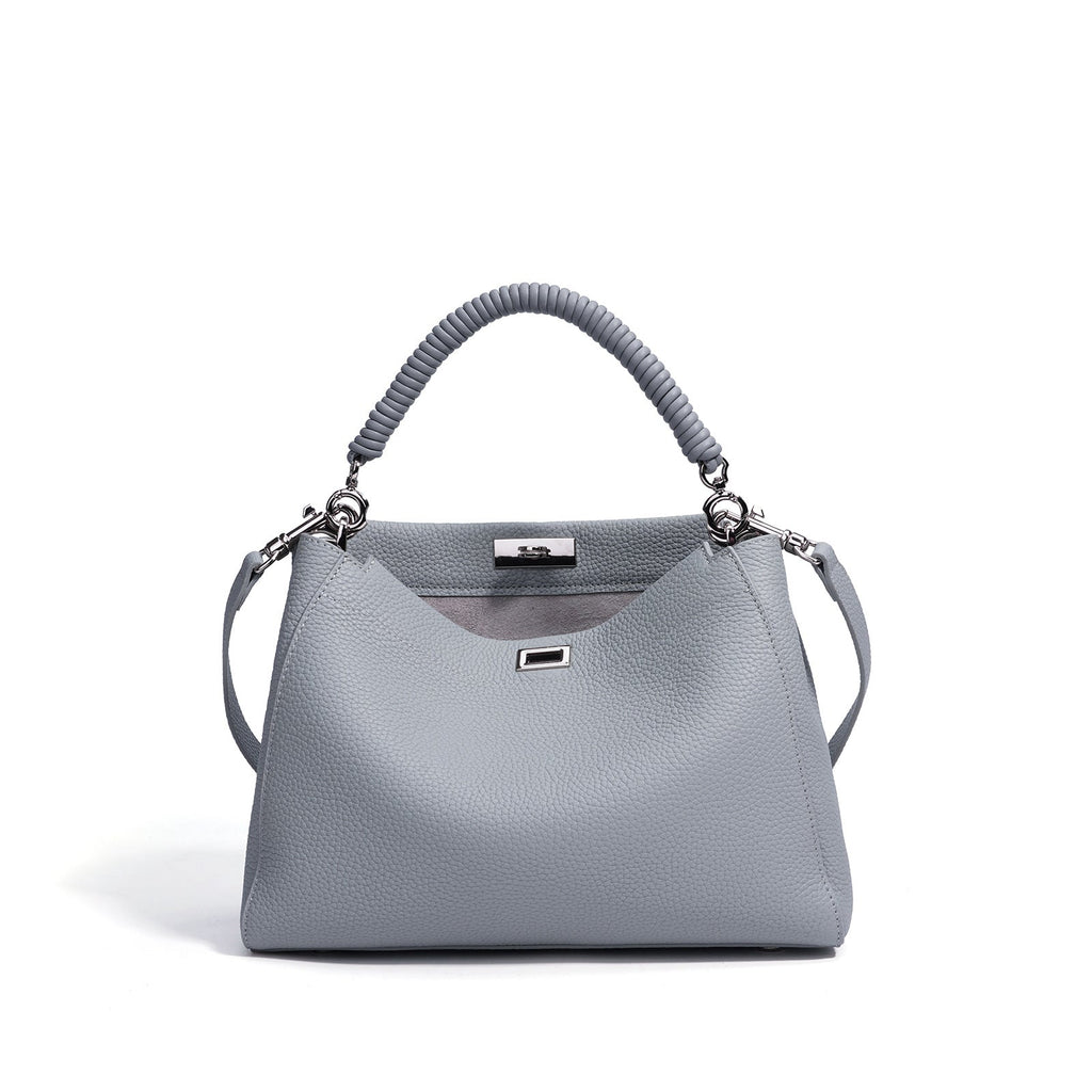 Large motorcycle-style crossbody bag by Plush Fashion Hub with multiple compartments and a bold, edgy design for fashion-forward looks.