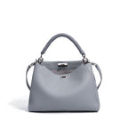Large motorcycle-style crossbody bag by Plush Fashion Hub with multiple compartments and a bold, edgy design for fashion-forward looks.