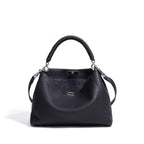 Large motorcycle-style crossbody bag by Plush Fashion Hub, featuring multiple compartments and a bold, edgy design.