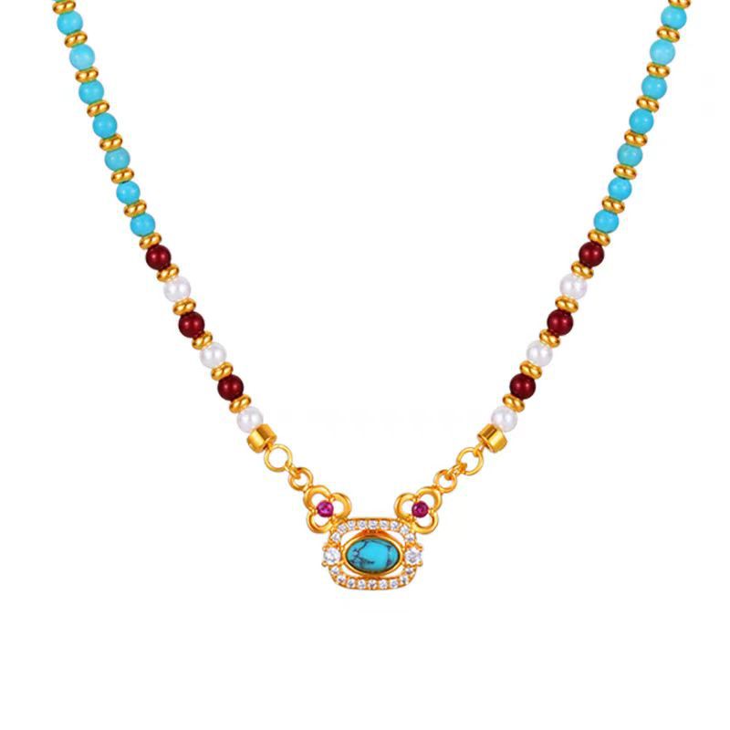 Natural turquoise pearl Chinese-style clavicle necklace with traditional design, featuring vibrant blue-green pearls and intricate craftsmanship.