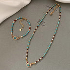 Natural turquoise pearl necklace featuring Chinese traditional style clavicle design, crafted by Plush Fashion Hub.