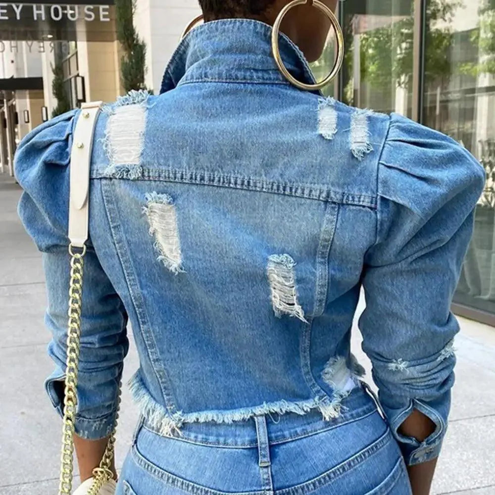 Women’s ripped denim jacket by Plush Fashion Hub featuring vintage casual style with puff sleeves, perfect for spring.
