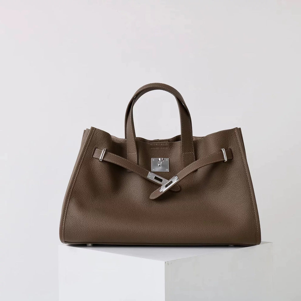 New top layer cowhide all-match crossbody bag for women by Plush Fashion Hub, showcasing a stylish black leather design with adjustable strap.