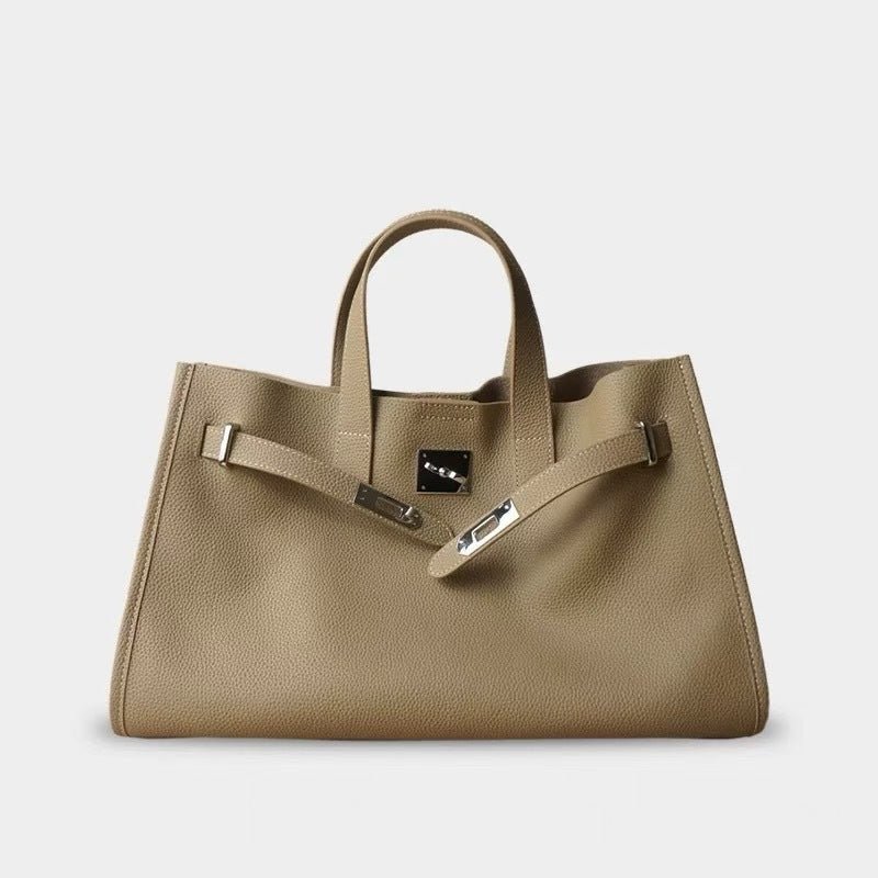 New top-layer cowhide crossbody bag for women, all-match design with adjustable strap and stylish look.