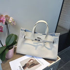Elegant cowhide crossbody bag for women, featuring a versatile all-match design by Plush Fashion Hub.