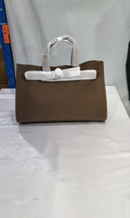 New top layer cowhide all-match crossbody bag for women, featuring a sleek design and adjustable strap from Plush Fashion Hub.