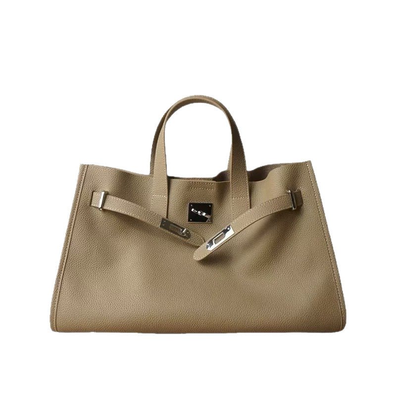 New cowhide crossbody bag for women by Plush Fashion Hub, featuring a versatile top layer design and adjustable strap.