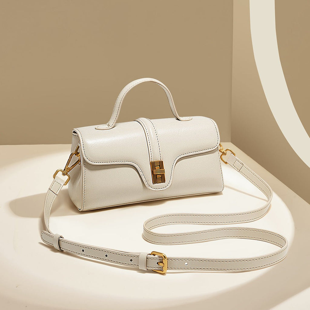 Plush Fashion Hub Niche Original High Sense Retro Cambridge Messenger Bag with leather strap and multiple compartments.