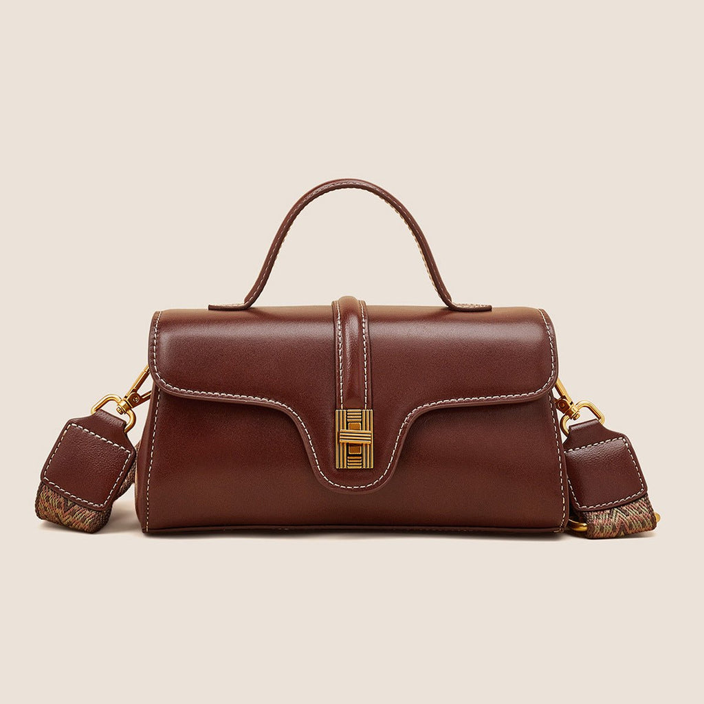 Plush Fashion Hub Niche Original High Sense Mild Luxury Retro Cambridge portable messenger bag with leather strap and vintage design.