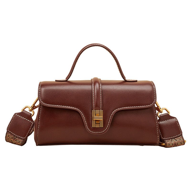 Plush Fashion Hub Niche Original High Sense Mild Luxury Retro Cambridge Messenger Bag with adjustable strap and multiple compartments.
