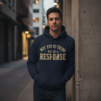 Hispanic male wearing the "Not Everything Needs a Response" hoodie from Wear Your Worship's Identity Line. Casual lifestyle shot.