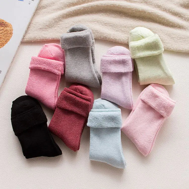 Thick cotton women's thermal socks in cozy beige, designed for warmth during autumn and winter.