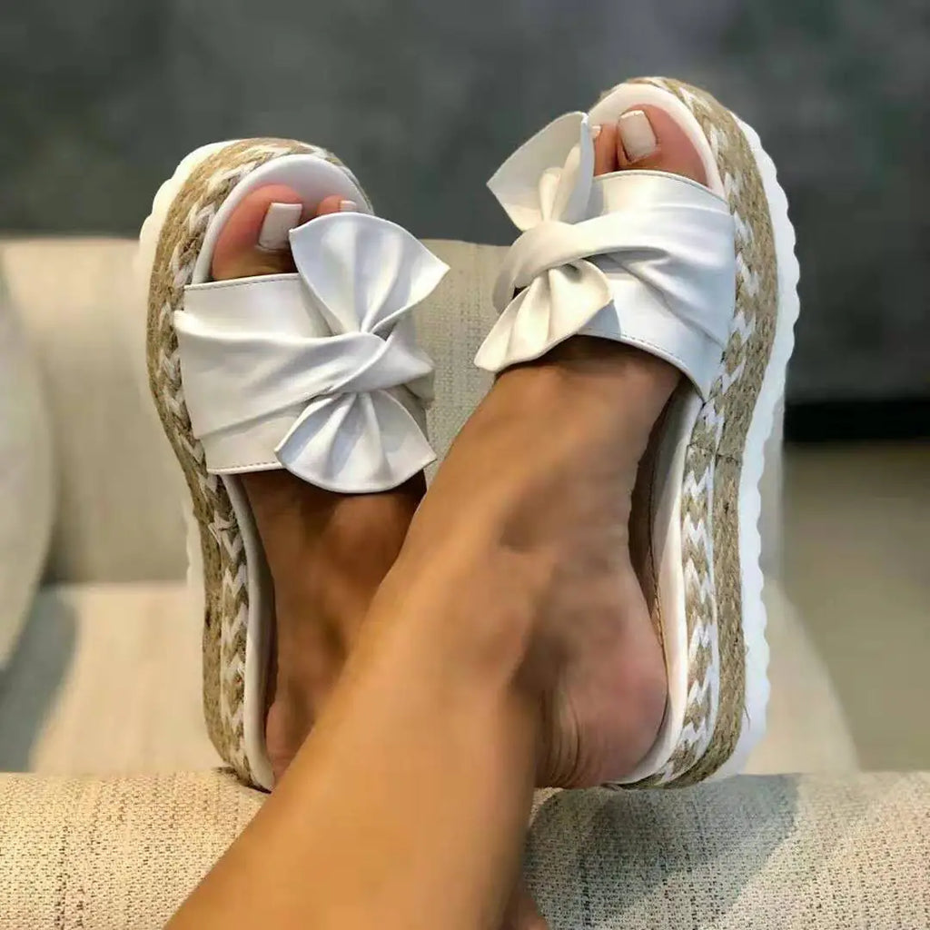 Women’s bow sandals with platform wedge heel by Trendy Attic Store01, featuring stylish bow detail and comfortable open-toe design.
