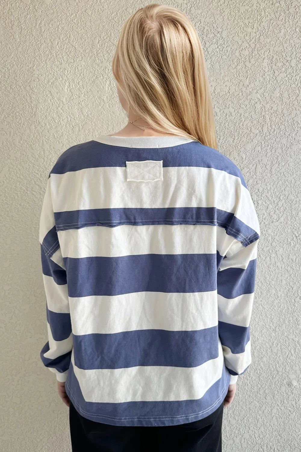 Women's striped Pima cotton long sleeve T-shirt with exposed seam detail, round neck and contrast design, casual women's apparel.