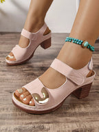 Women's open toe block heel sandals by Trendsi with faux leather straps and comfortable mid-heel design.