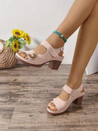 Women's open toe block heel sandals by Trendsi featuring comfortable faux leather straps and mid-height heels.