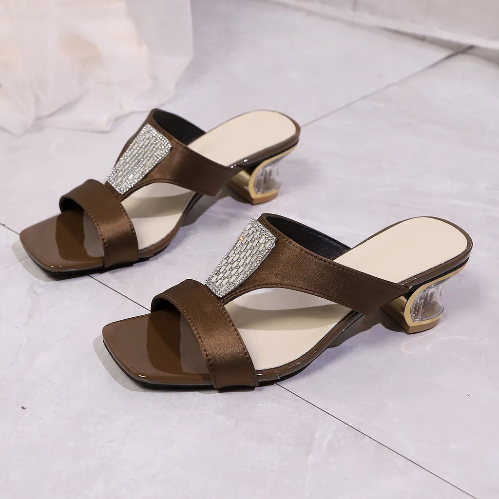 Women's open-toe block heel sandals by Trendsi, stylish chic footwear with cushioned footbed and trendy design.