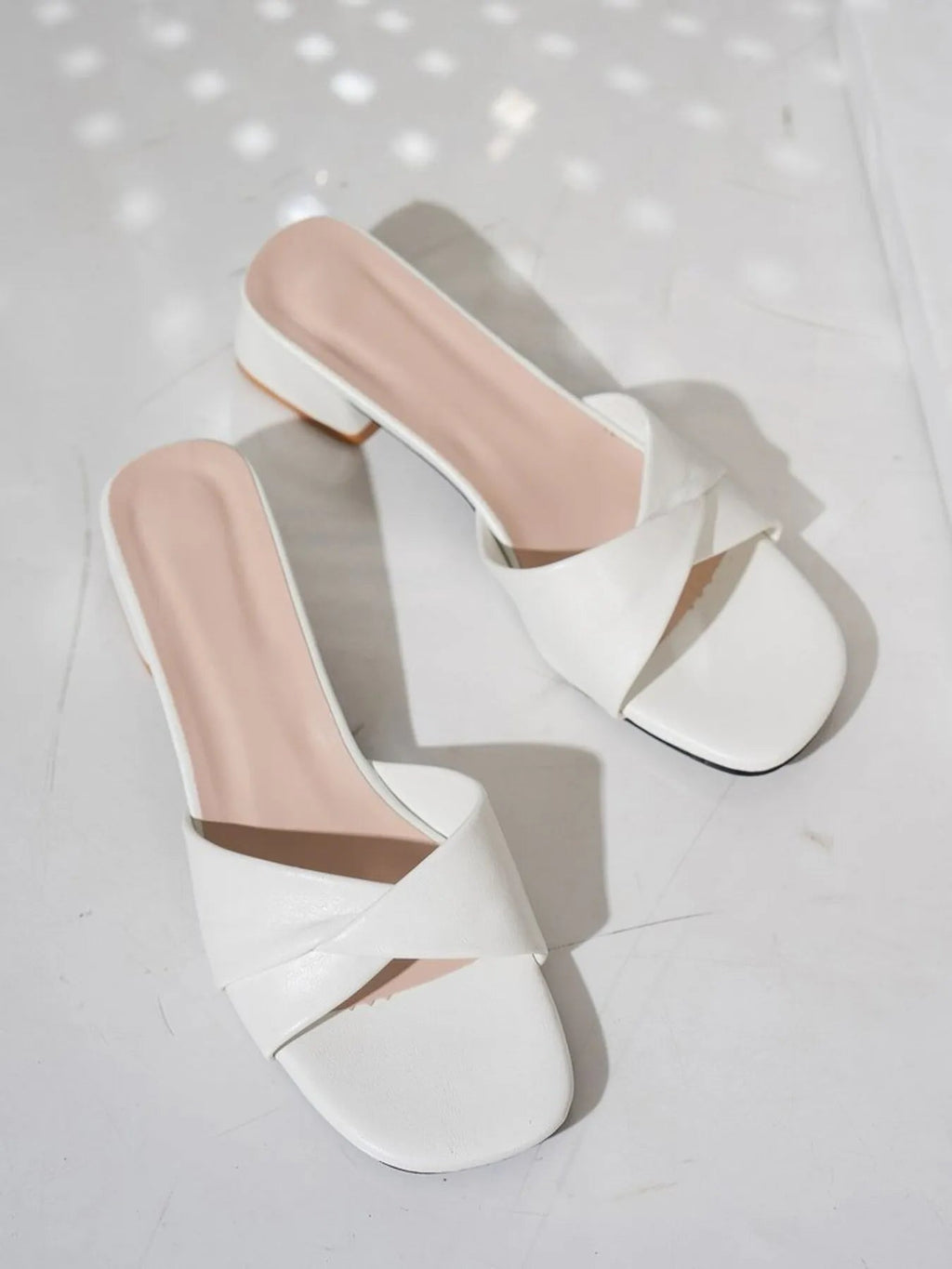 Women's open-toe block heel sandals by Trendsi featuring stylish faux leather straps and a comfortable heel height.