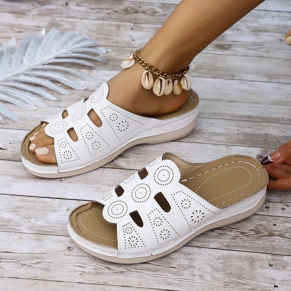 Women's open-toe cutout low heel sandals by Plush Fashion Hub, showcasing stylish design and comfortable footwear for warm weather.