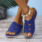 Women's open-toe cutout low heel sandals by Trendsi, featuring a stylish design with comfortable foot support and fashionable open-toe detail.