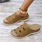 Women's open-toe cutout low heel sandals by Trendsi, featuring stylish design and comfortable fit.