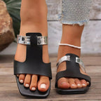 Women's open-toe vegan leather flat sandals with minimalist design, comfortable for everyday wear, by Trendsi.