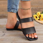 Women's open-toe vegan leather flat sandals with stylish design, comfortable everyday footwear by Trendsi.