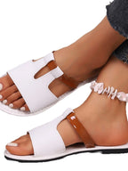 Women's chic vegan leather open toe flat sandals by Trendsi, featuring comfortable summer-ready design and stylish open-toe style.
