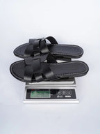 Women's faux leather open-toe flat sandals with a comfortable design, featuring a stylish and breathable open-toe style.
