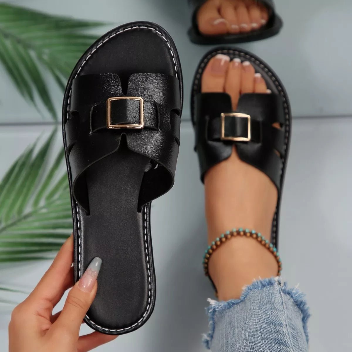 Women's open-toe flat sandals made of PU leather by Plush Fashion Hub, featuring a comfortable design and stylish open-toe style.