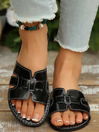 Women's open-toe flat sandals by Trendsi, stylish casual summer footwear with comfortable open-toe design and flat sole.