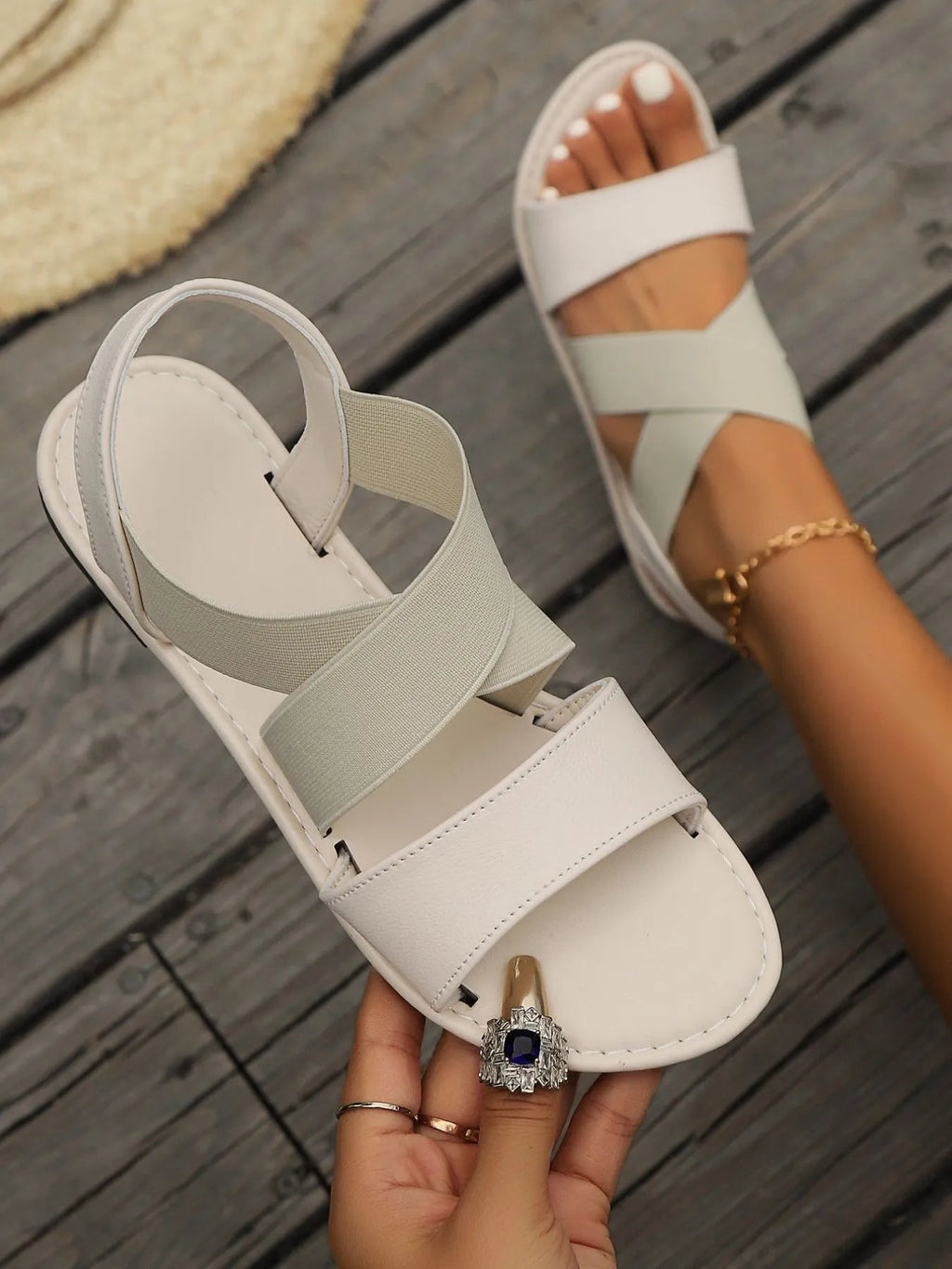 Women's breathable mesh open-toe flat sandals with stylish design and comfortable flat sole, perfect for casual summer wear.