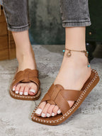 Women's open toe PU leather flat sandals by Trendsi, featuring a comfortable design for stylish summer footwear.