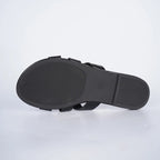 Women's faux leather open-toe flat sandals with comfortable design, featuring stylish straps and a flat sole perfect for casual wear.