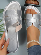 Women's open-toe flat sandals by Trendsi featuring a stylish, comfortable design for casual summer wear.