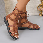 Women's lace-up open-toe flat sandals from Trendsi, featuring comfortable summer footwear with stylish design and easy-to-wear style.