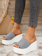 Women's breathable mesh open toe platform wedge sandals with a stylish design, featuring a comfortable heel and trendy open-toe style.