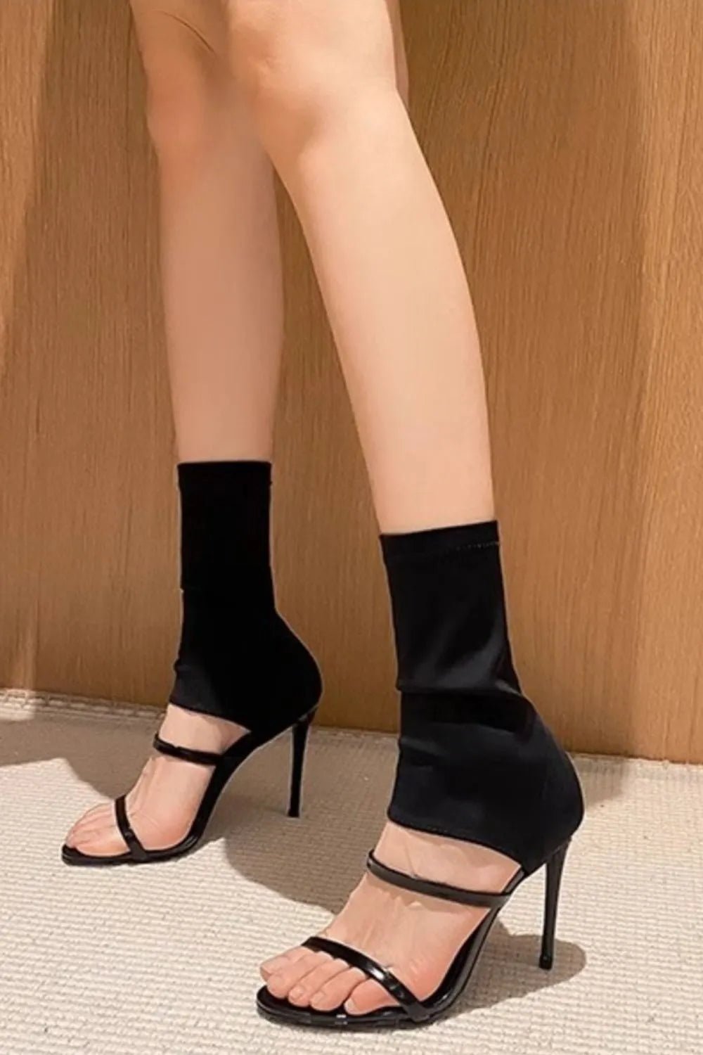 Women's open toe stiletto high heel sandals by Trendsi featuring elegant design and sleek straps, perfect for evening wear.